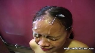 Huge facial cumshots soak a tiny Asian amateur